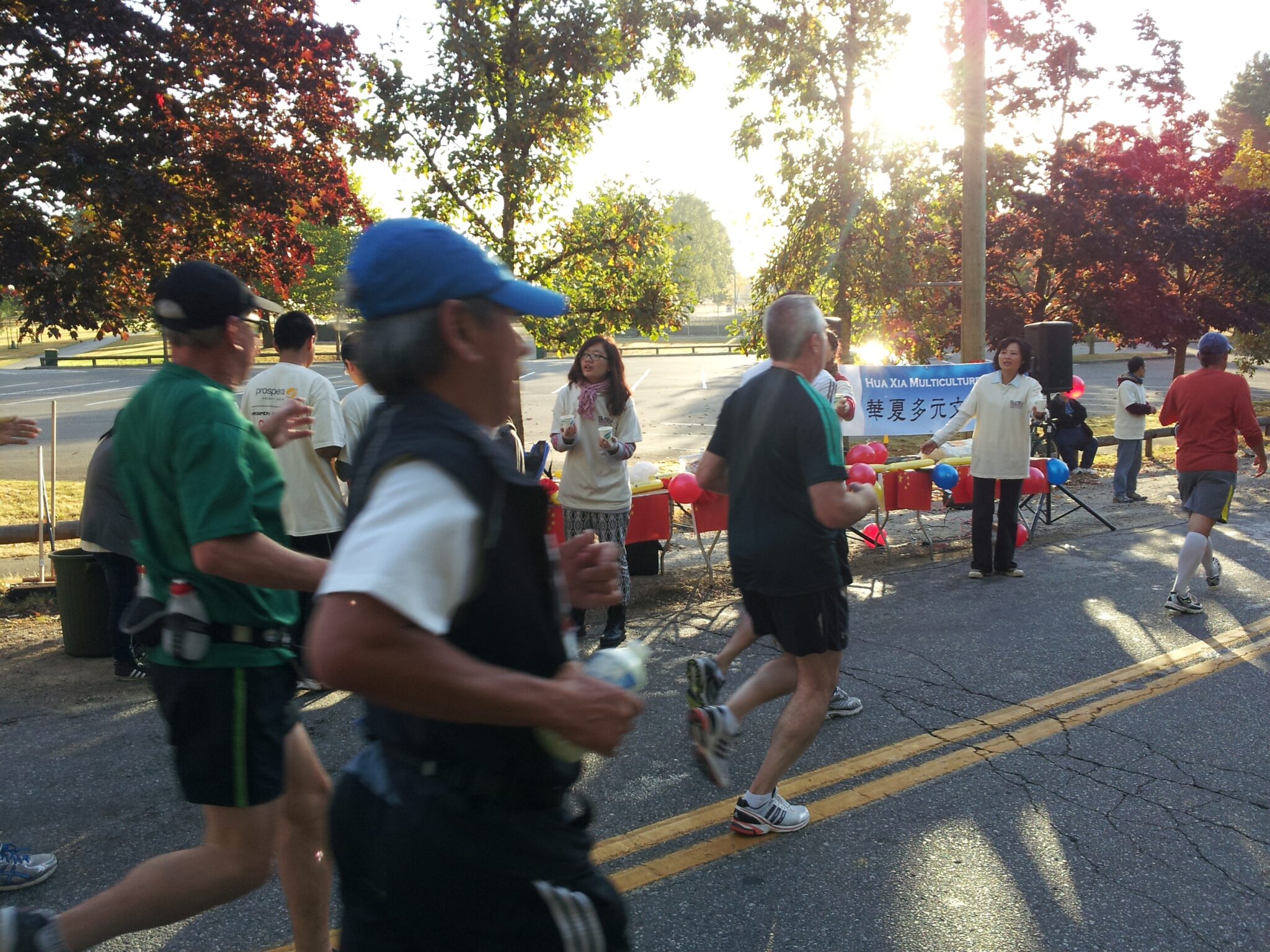 HXMS volunteers supporting runners at a community event
