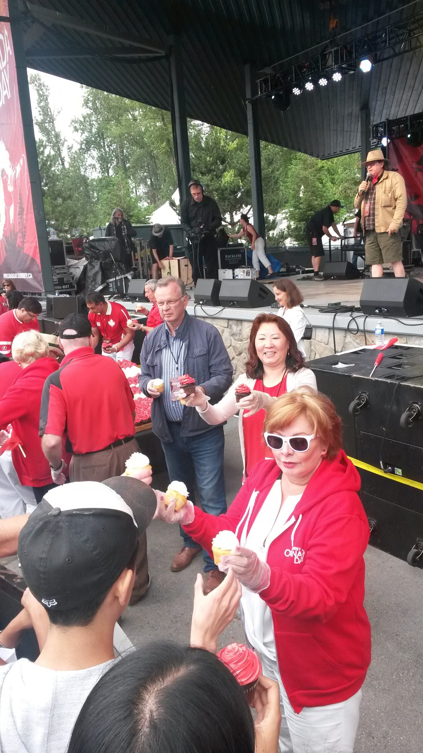 HXMS volunteers sharing treats at a Canada Day event