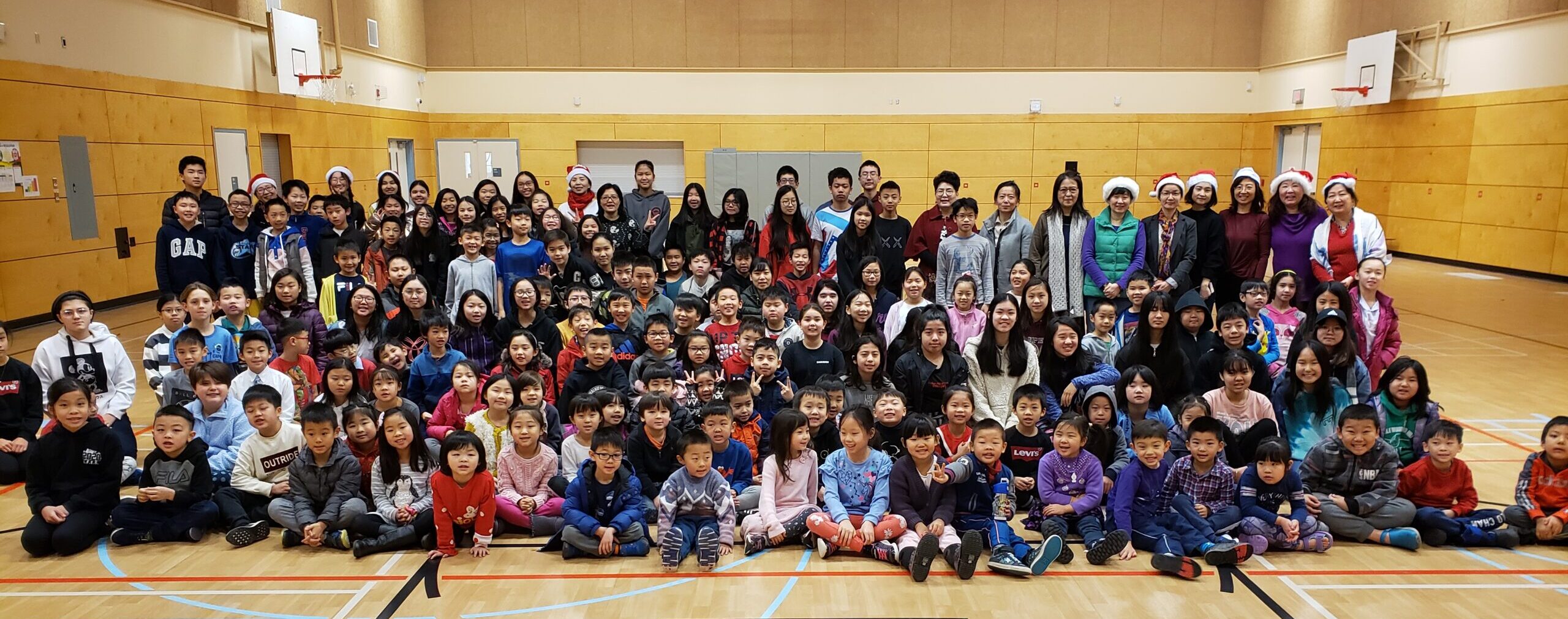 HXMS students, families and community members gathered in a gymnasium