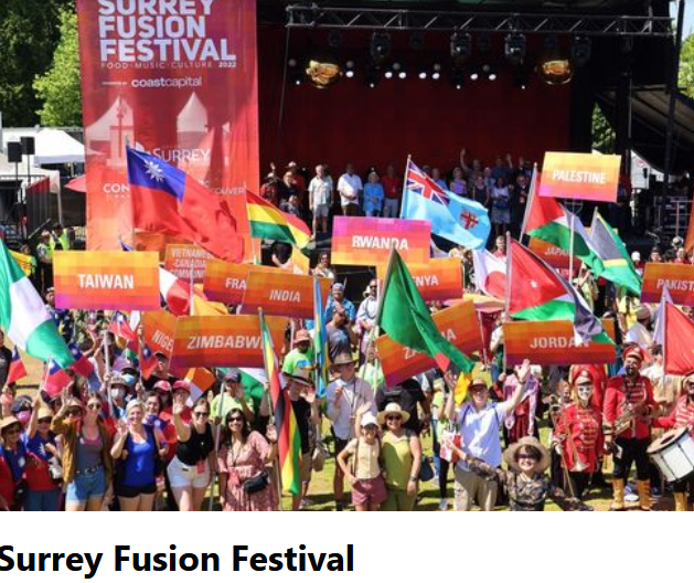 Multicultural festival participants holding international flags